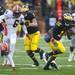 Michigan senior quarterback Denard Robinson runs and loses his shoe in the second quarter against Illinois on Saturday. Michigan leads 17-0 at halftime. Daniel Brenner I AnnArbor.com